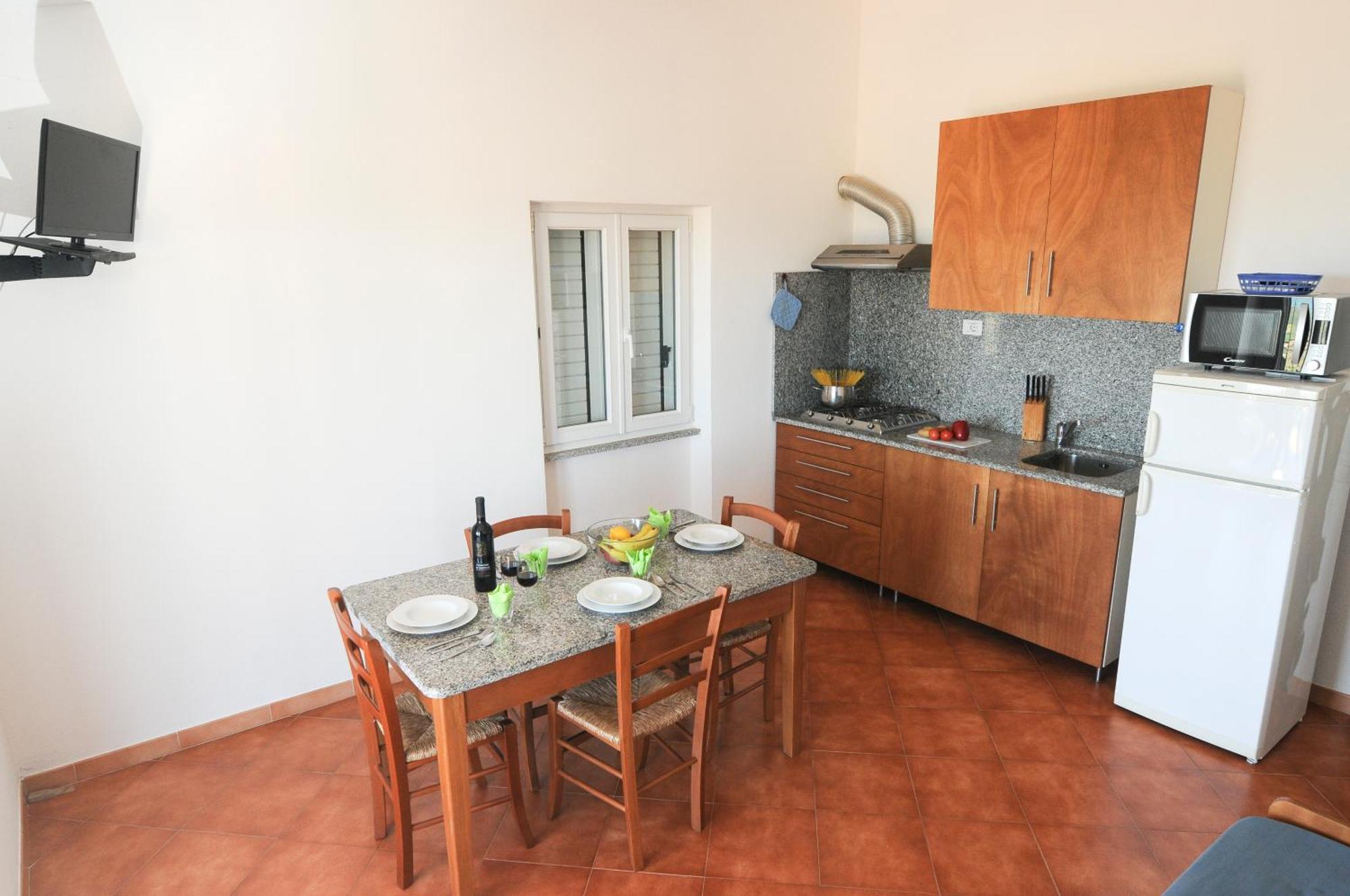 Gf Apartments Li Seddi Badesi Luaran gambar